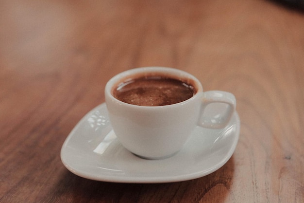 cup of Turkish coffee on table