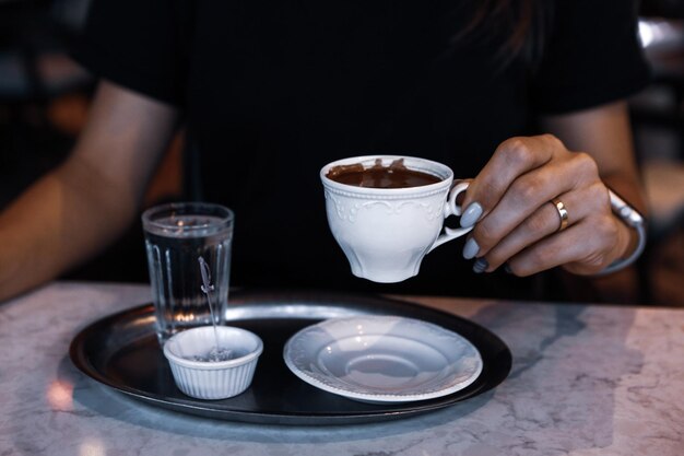 cup of Turkish coffee on table