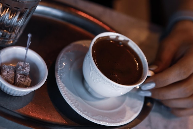 cup of Turkish coffee on table