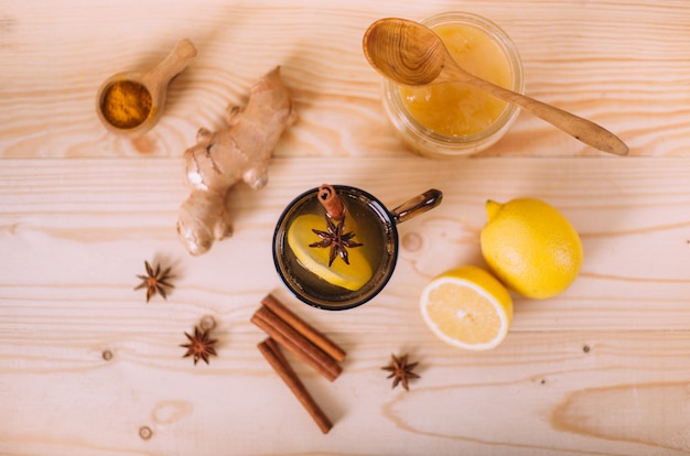 Cup warm water with lemon, honey and ginger root.