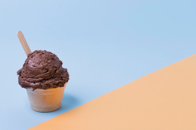 Cup with chocolate ice cream with copy-space