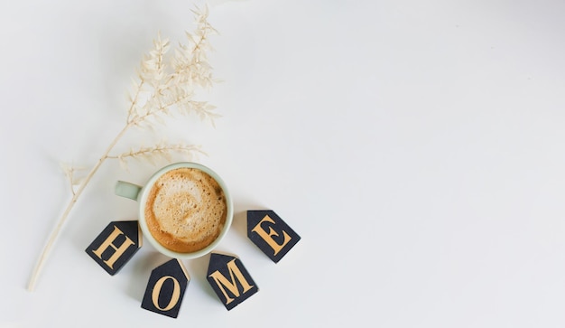 Photo cup with coffee and home decoration