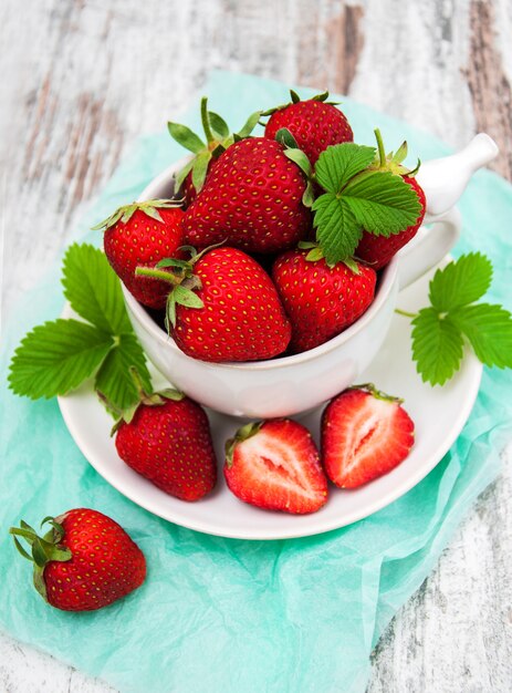 Cup with fresh strawberries