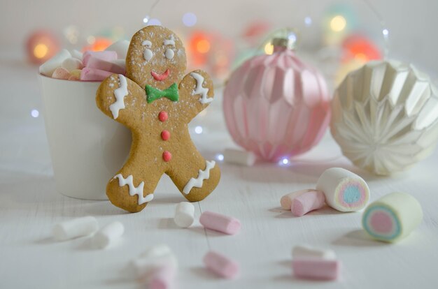 Cup with marshmallows and gingerbread man