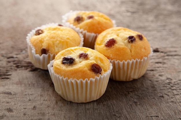 Cupcake currant on wooden table