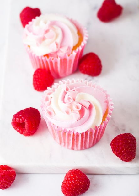 Cupcake muffin with raspberry cream dessert