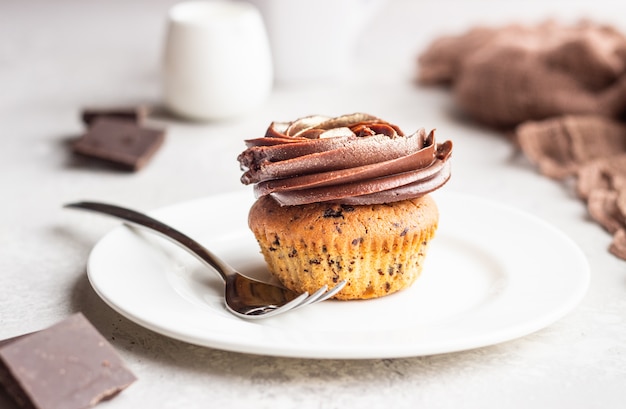 Cupcake with chocolate swirl icing