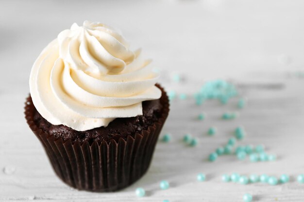 Cupcake on wooden table