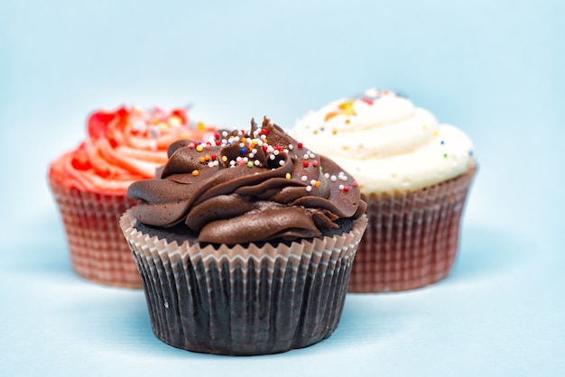 Cupcakes on blue background