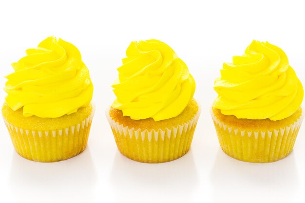 Cupcakes decorated with bright color icing for Mardi Gras party.