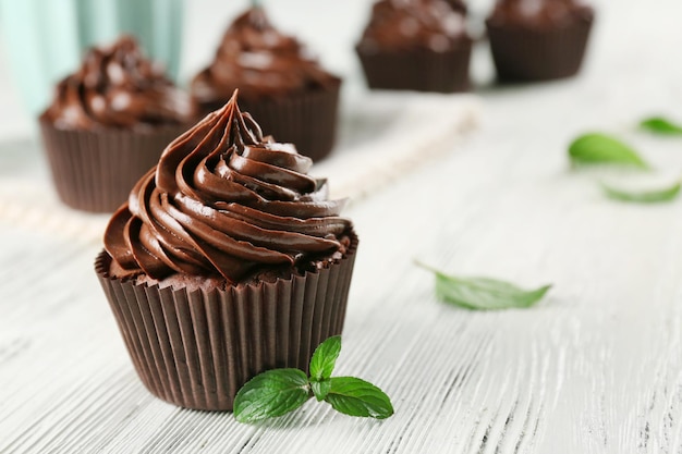 Cupcakes served with a drink on table