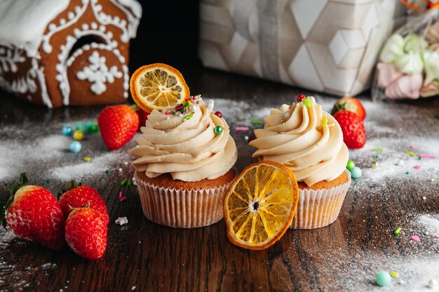 Cupcakes with caramel cream on candy table