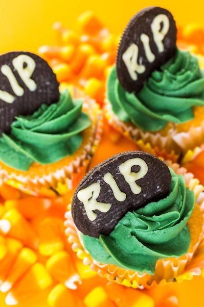 Cupcakes with green icing prepared as halloween treats