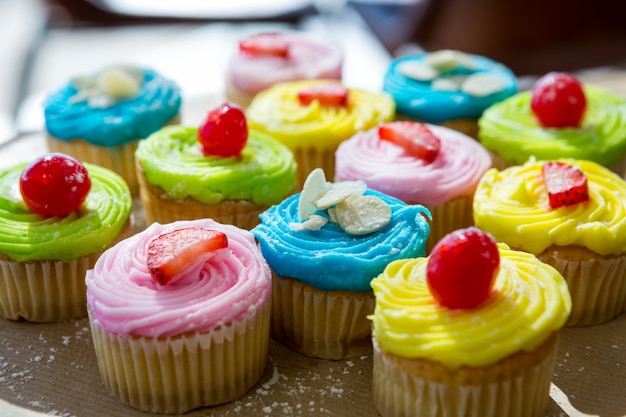 Cupcakes with whipped cream and berries