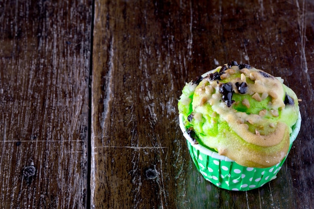 Photo cupcakes on wood table