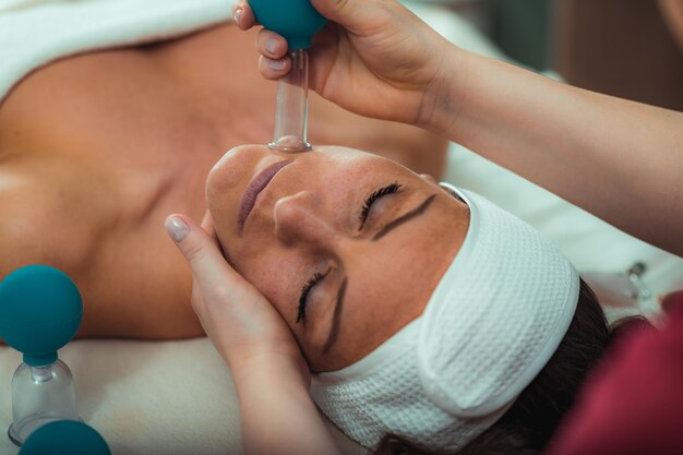 Cupping therapy ventosa cupping face treatment in a beauty salon