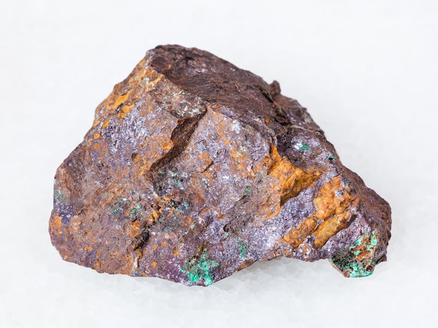 Cuprite and Malachite in Limonite mineral on white