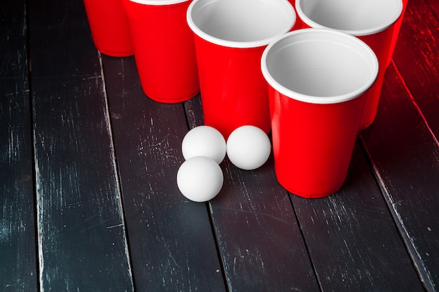 Photo cups for game beer pong on the table