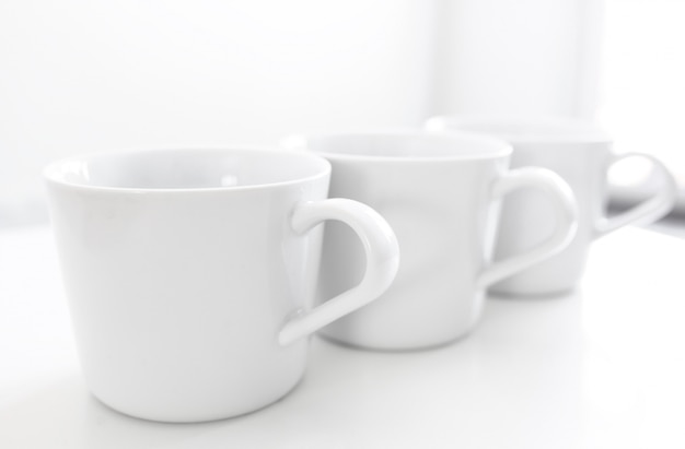 Cups on kitchen table