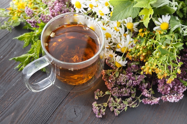 Cups of mint tea on table