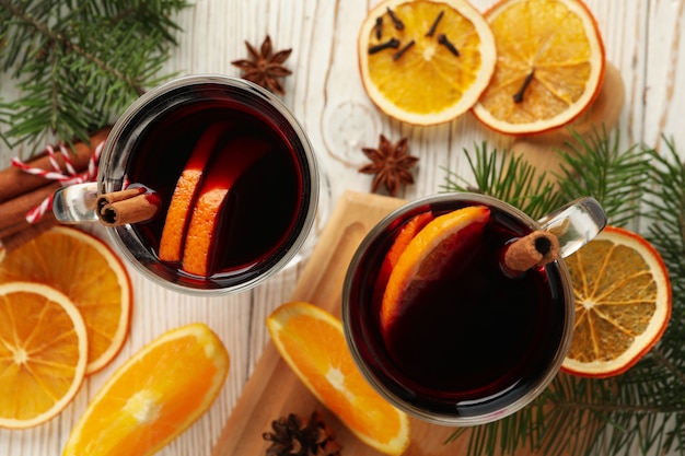 Cups of mulled wine and ingredients