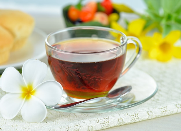 Cups of tea on wooden table