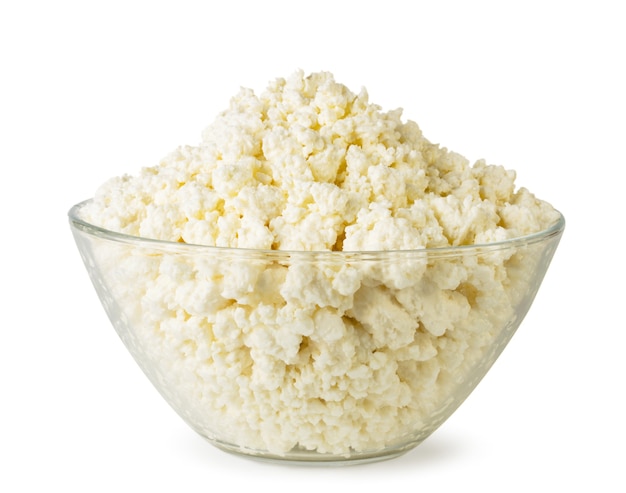 Curd in a glass plate close-up on a white background. Isolated