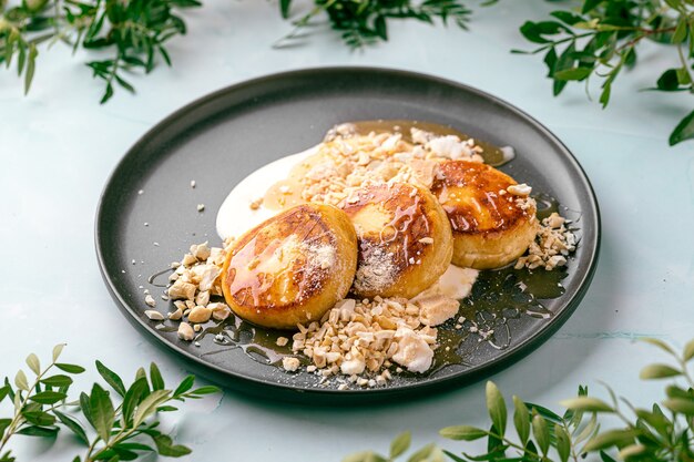 Curd pancakes with salted caramel and yogurt