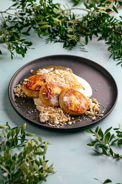 Curd pancakes with salted caramel and yogurt