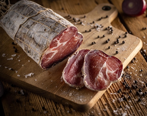 Cured coppa coated in mold