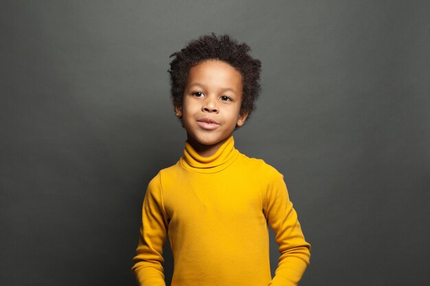 Curious black child boy ob black portrait