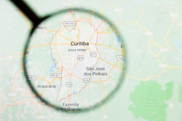 Concetto illustrativo di visualizzazione della città di curitiba, brasile sullo schermo di visualizzazione tramite la lente d'ingrandimento