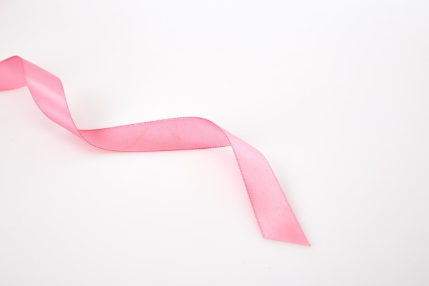 Curled Pink Ribbon On White