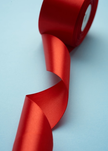 Curled red silk ribbon close-up