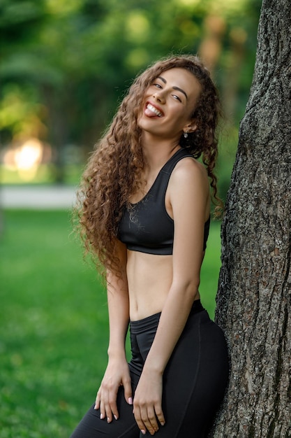 Curly beautiful smiling woman