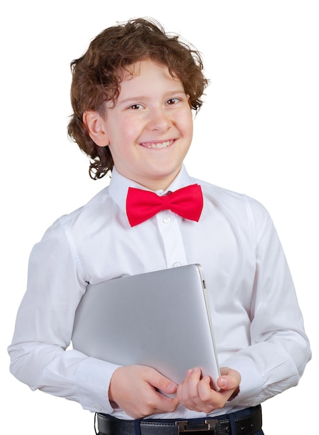 Curly boy in formal suit with laptop