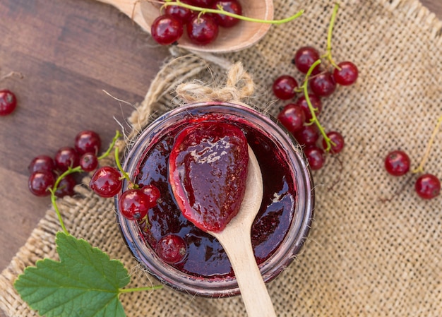 Currant jam.red currant jam and red currant with leaves