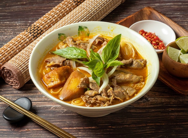 curry beef pho served in bowl isolated on table top view of taiwan food