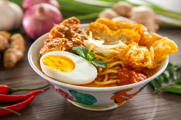 Curry laksa which is a popular traditional hot and spicy noodle\
soup from the culture in malaysia