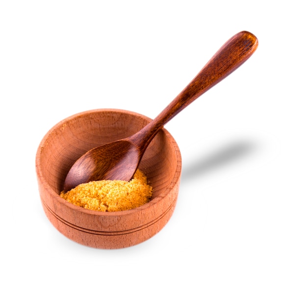 Curry powder in a bowl on the white background