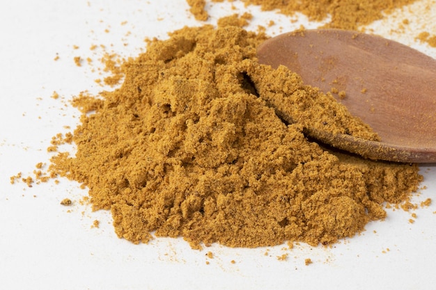 Curry powder isolated on white background Selective focus