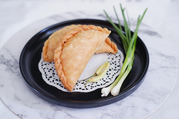 Curry puff kari pap or Pastel Goreng is Pastry Popular in Indonesiafried pastry with filling of