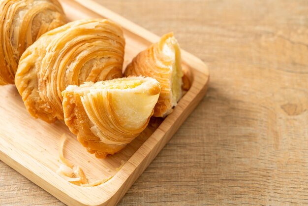 curry puff pastry stuffed beans on wooden plate