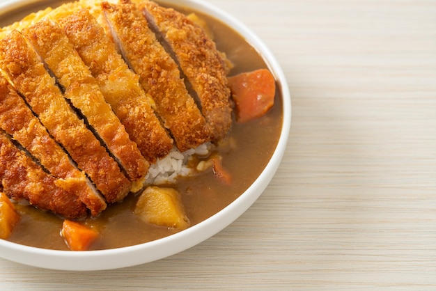 curry rice with tonkatsu fried pork cutlet and creamy omelet - Japanese food style