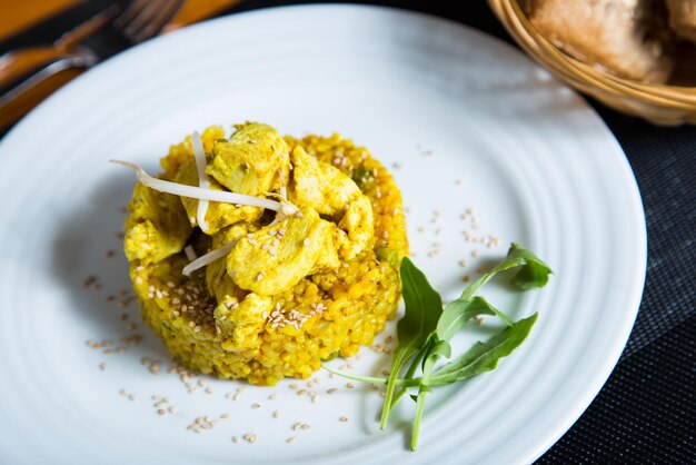 Curry risotto with chicken risotto is a northern italian rice dish cooked with broth