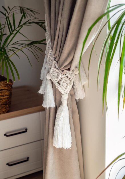 curtain tieback in boho style in interior