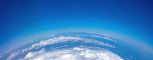 Curvature of planet earth Aerial shot Blue sky and clouds