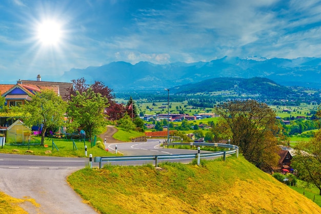 Curved road in Alps village Grabs Werdenberg St Gallen Swit