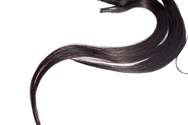 curvy black long hair isolated on white background hair extensions close up