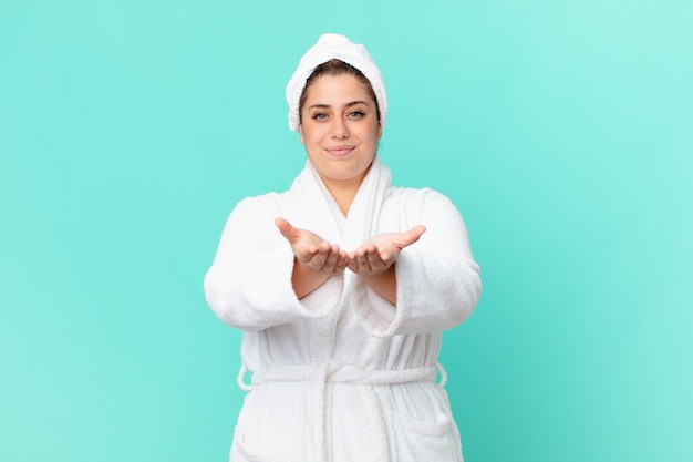 curvy pretty woman after a shower wearing bathrobe